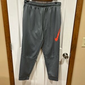 Nike Men's Gray Joggers with Orange Swoosh